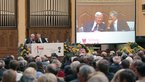 Helmut Schmidt and Hans Küng together on the podium in front of an audience