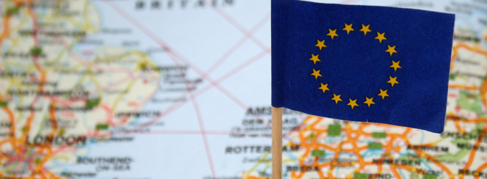 European flag in front of world map