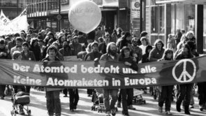 Demonstrators with banner against nuclear missiles