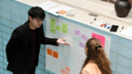 Workshop participants discussing on flipchart
