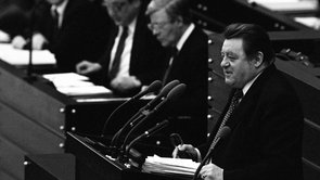 Franz Josef Strauß speaking in the Bundestag with Helmut Schmidt in the background