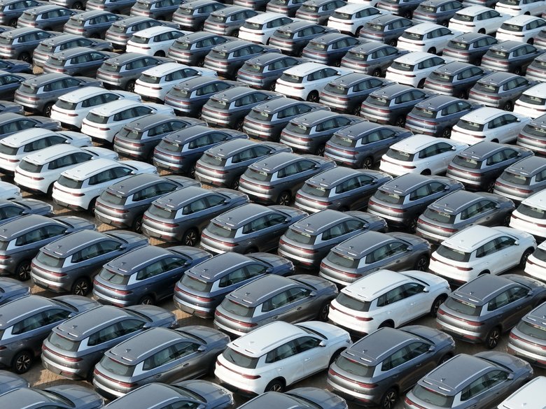 Many electric cars lined up in a row
