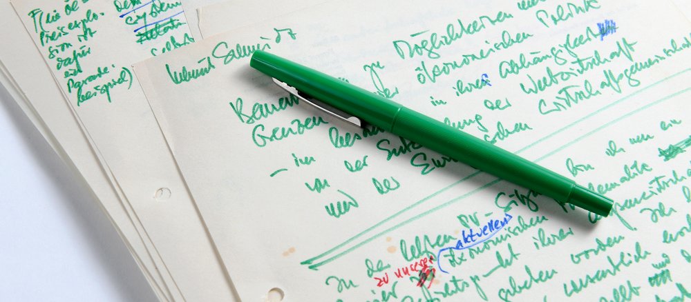 a handwritten letter with a green pen on it.