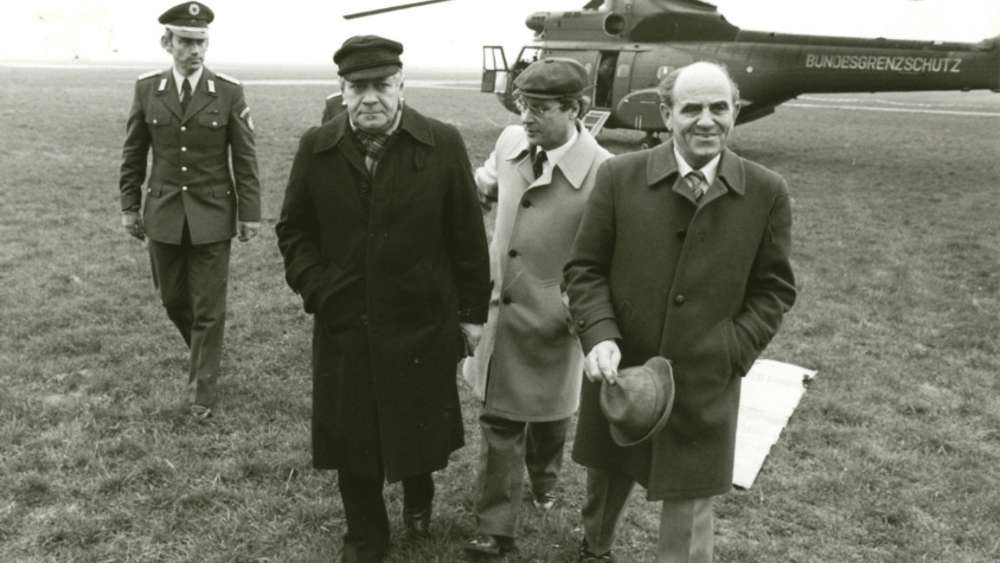 Helmut Schmidt in front of a helicopter
