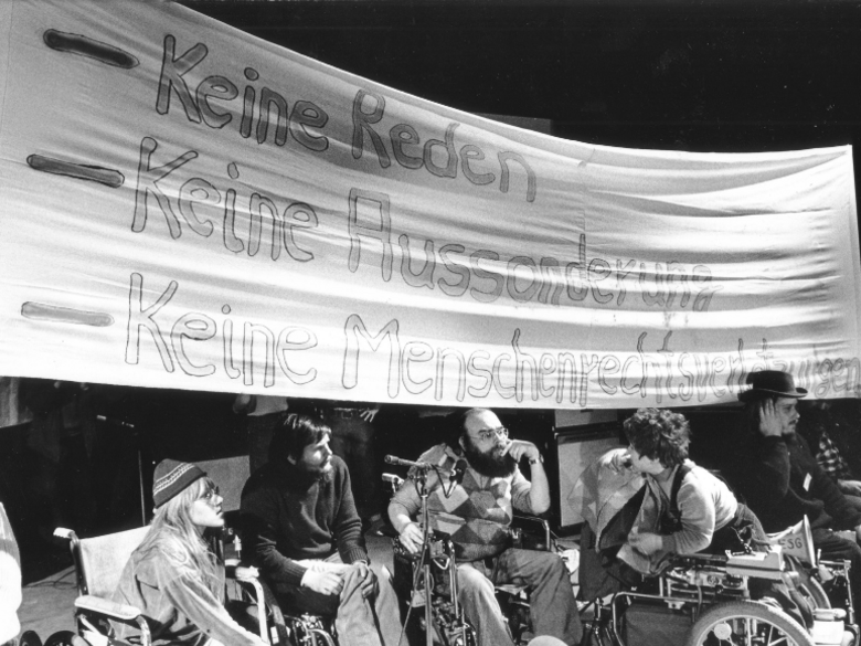 Activists of the disability rights movement on the stage of the Westfalenhalle in 1981
