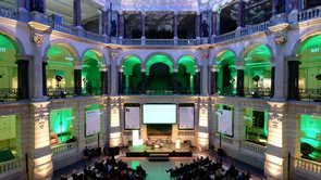 HSL_2022_Zapf Colour photo: large, green-lit room looking from above.