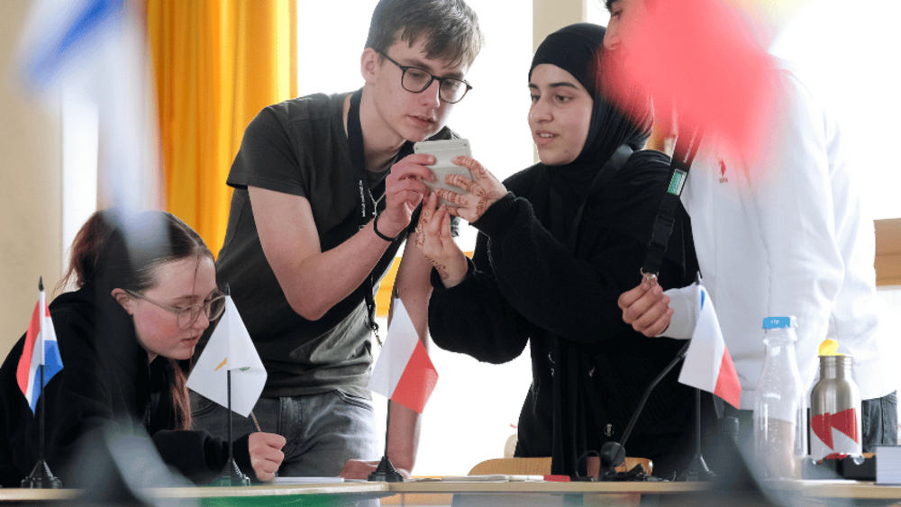 Pupils working together on a task from Unlock Europe