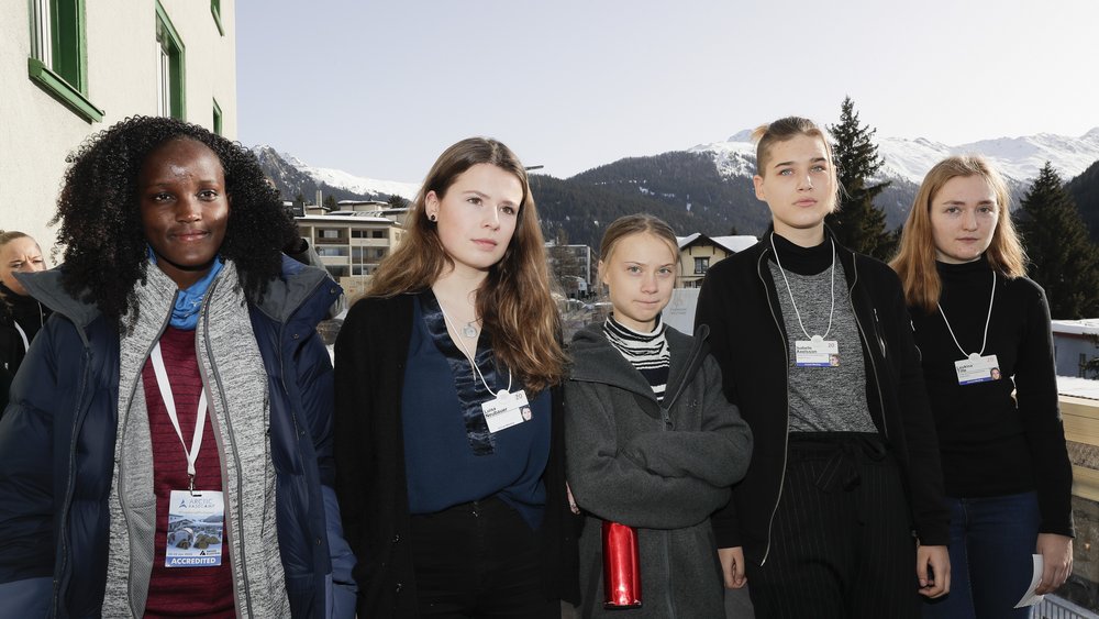 Luisa Neugebauer standing in line with other activists
