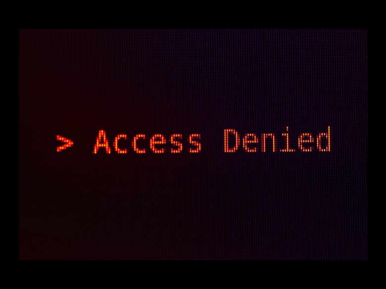 Letters in red Access Denied on black background