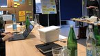 View of workshop with table and flipcharts
