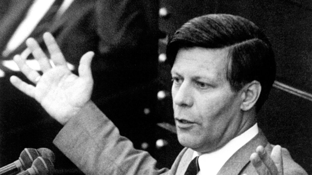 Black-and-white photograph of Helmut Schmidt giving a speech with outstretched arms