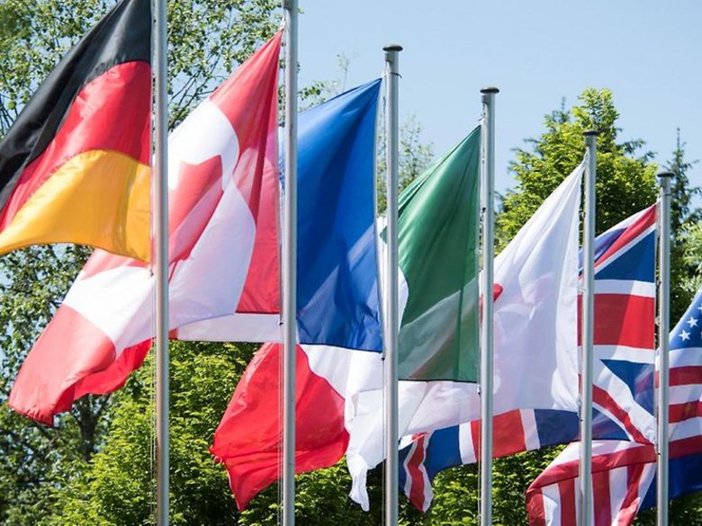 The G7 flags on the flagpole