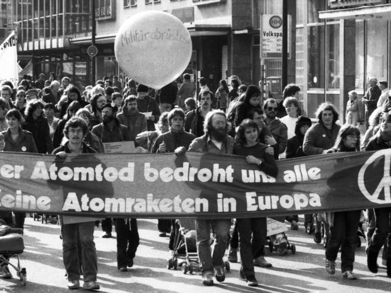 Demonstrators with banner against nuclear missiles